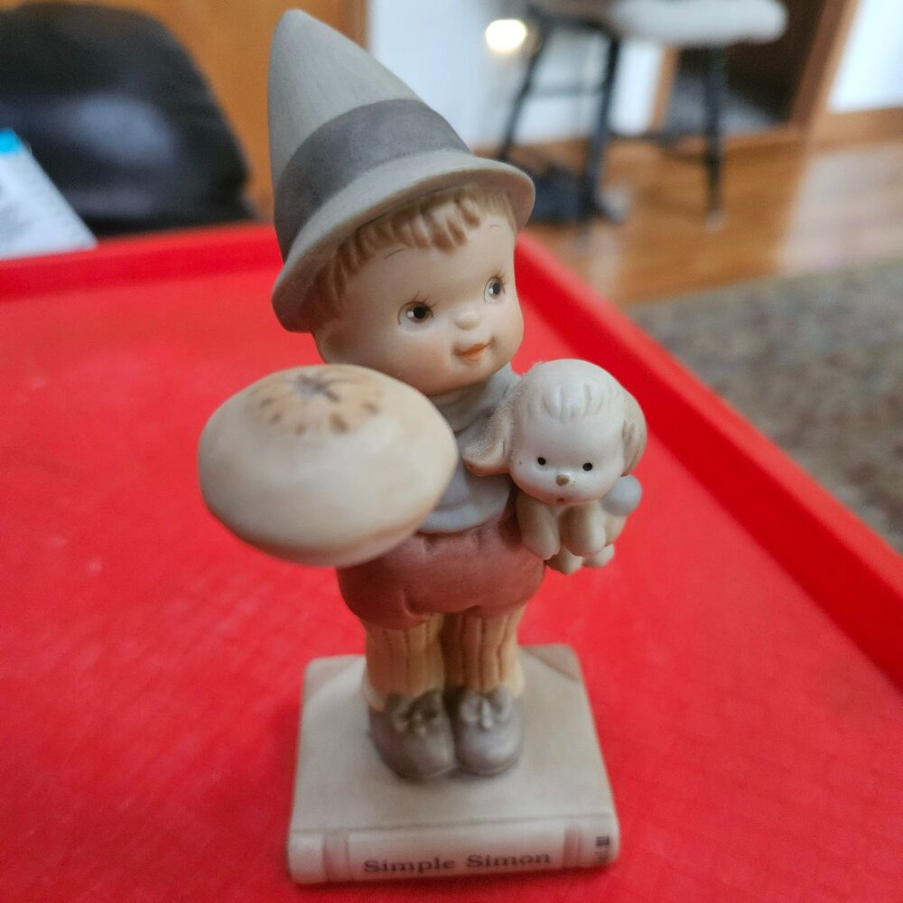 enesco figurine depicting simple Simon  character from nursery rhyme